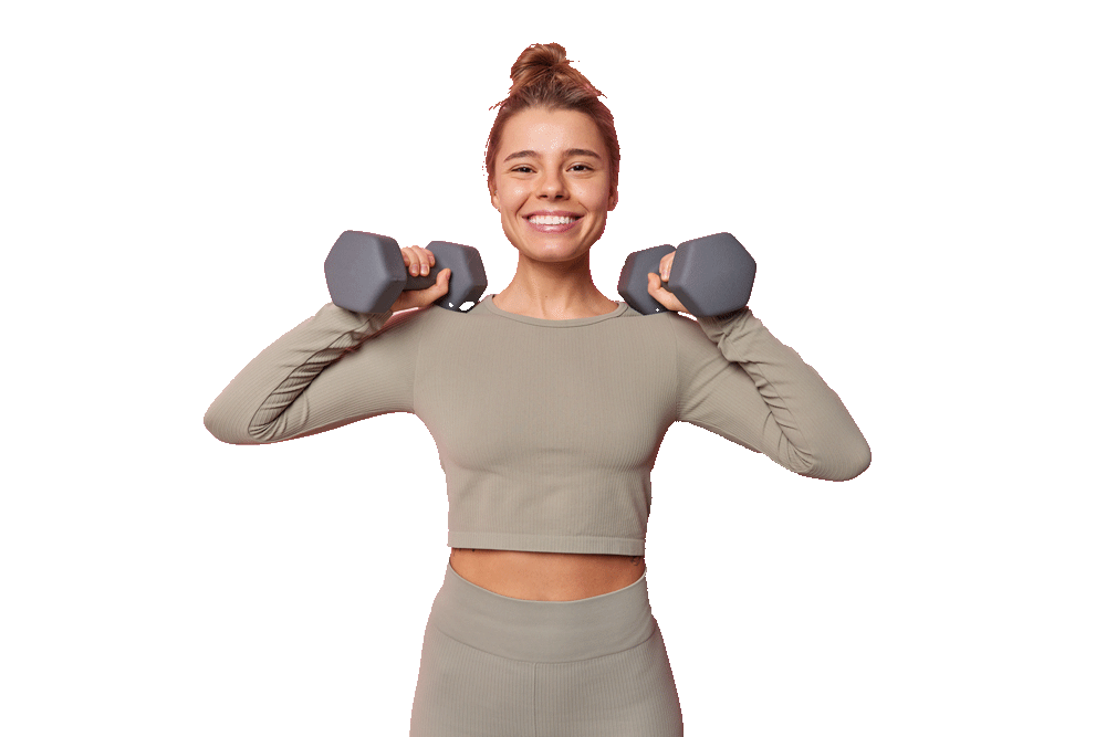 horizontal-shot-satisfied-motivated-sportswoman-has-regular-training-raises-arms-with-dumbbells-does-exercises-muscles-dressed-sportswear-smiles-toothily-isolated-pink-wall-sport-concept horizontal-shot-satisfied-motivated-sportswoman-has-regular-training-raises-arms-with-dumbbells-does-exercises-muscles-dressed-sportswear-smiles-toothily-isolated-pink-wall-sport-concept