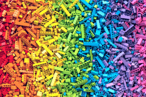 Lot of colorful rainbow toy bricks background